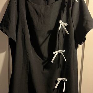 Very on trend dress with bows